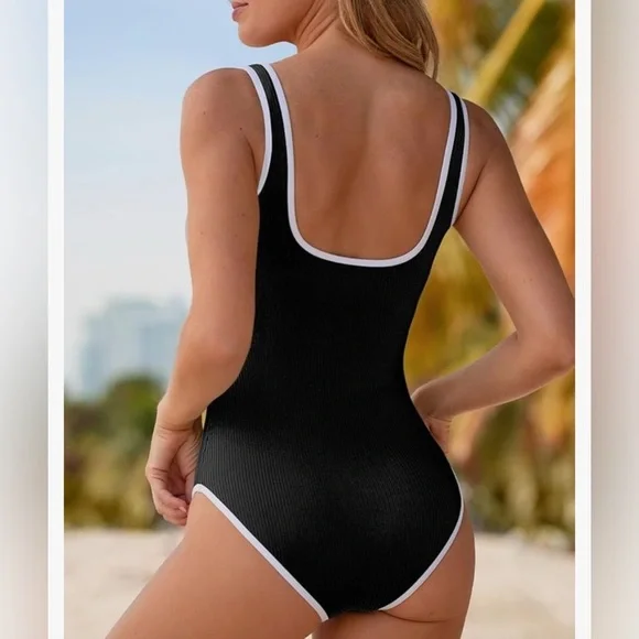NEW- Elegant Black Ribbed 
white trim Swimsuit
2025 Season
Large - Picture 5 of 6